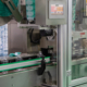 Process Of Pet Plastic Bottle On Automatic Sleeve Labeling Machine